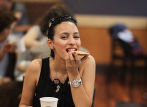 Woman free of morning sickness eats cookie